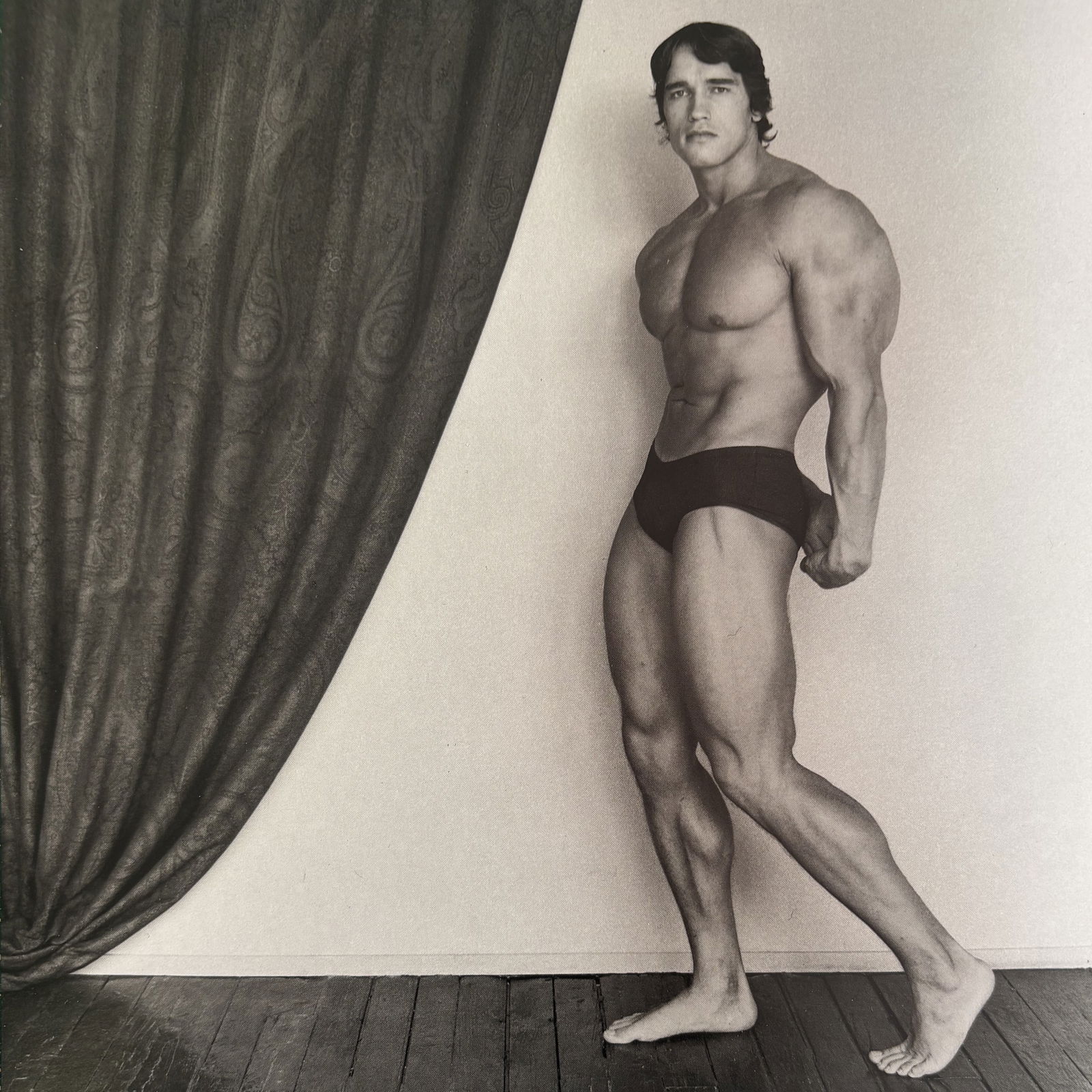 ROBERT MAPPLETHORPE ARNOLD SCHWARZENEGGER PHOTO LITHO: Robert Mapplethorpe Arnold Schwarzenegger Photo Lithograph mounted to same size board measuring at 7.5x7.5 inches