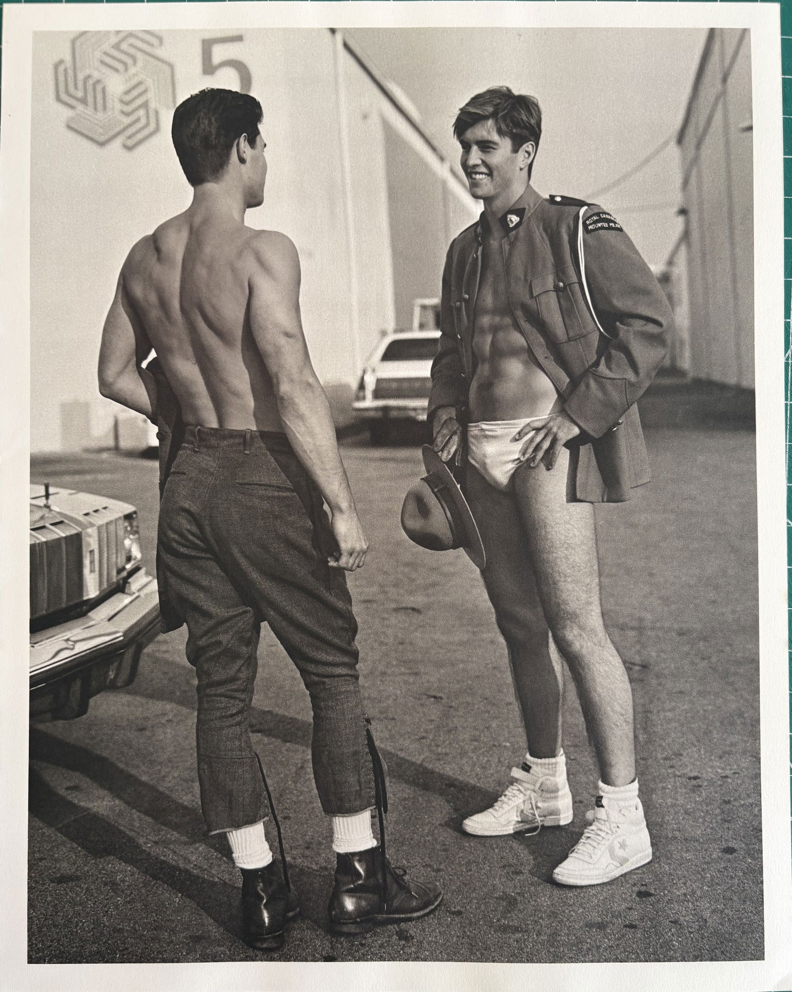 BRUCE WEBER SEMI NUDE MALE PHOTO LITHO: Bruce Weber Semi Nude Male Photo Lithograph mounted to same size board measuring at 9x12 inches