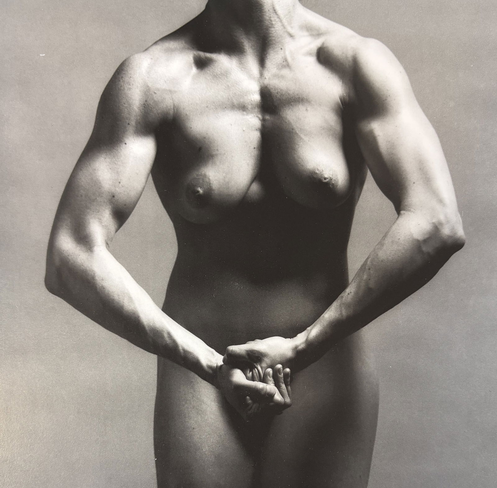 ROBERT MAPPLETHORPE LISA LYON PHOTO LITHO: Robert Mapplethorpe Lisa Lyon Photo Lithograph mounted to same size board measuring at 7.5x7.5 inches