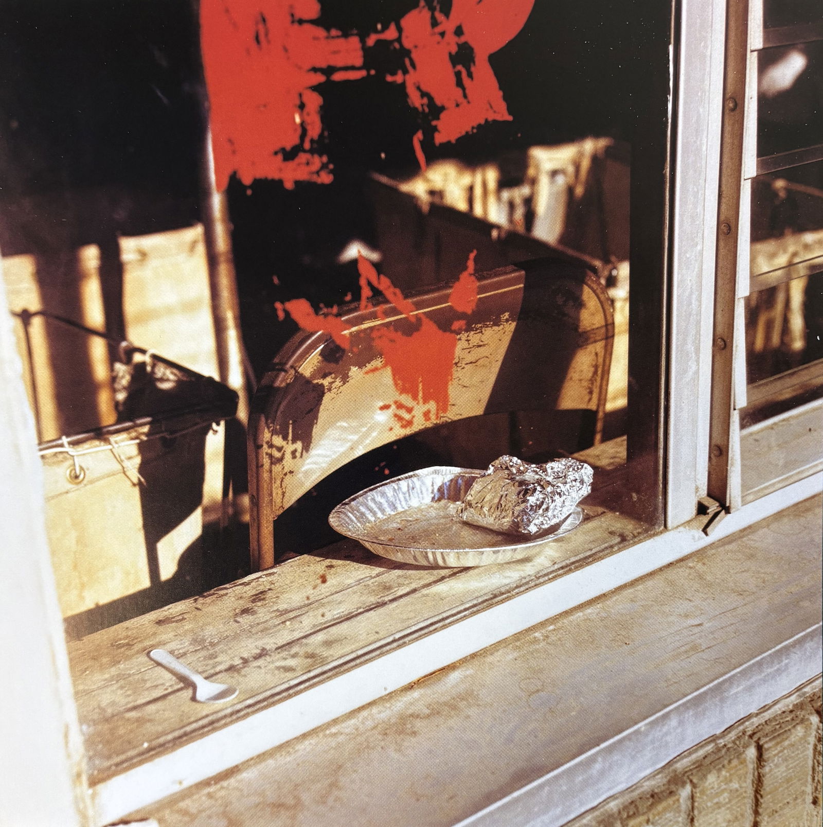 WILLIAM EGGLESTON UNTITLED PHOTO LITHO: William Eggleston Untitled Photo Lithograph mounted to same size board measuring at 9x9 inches