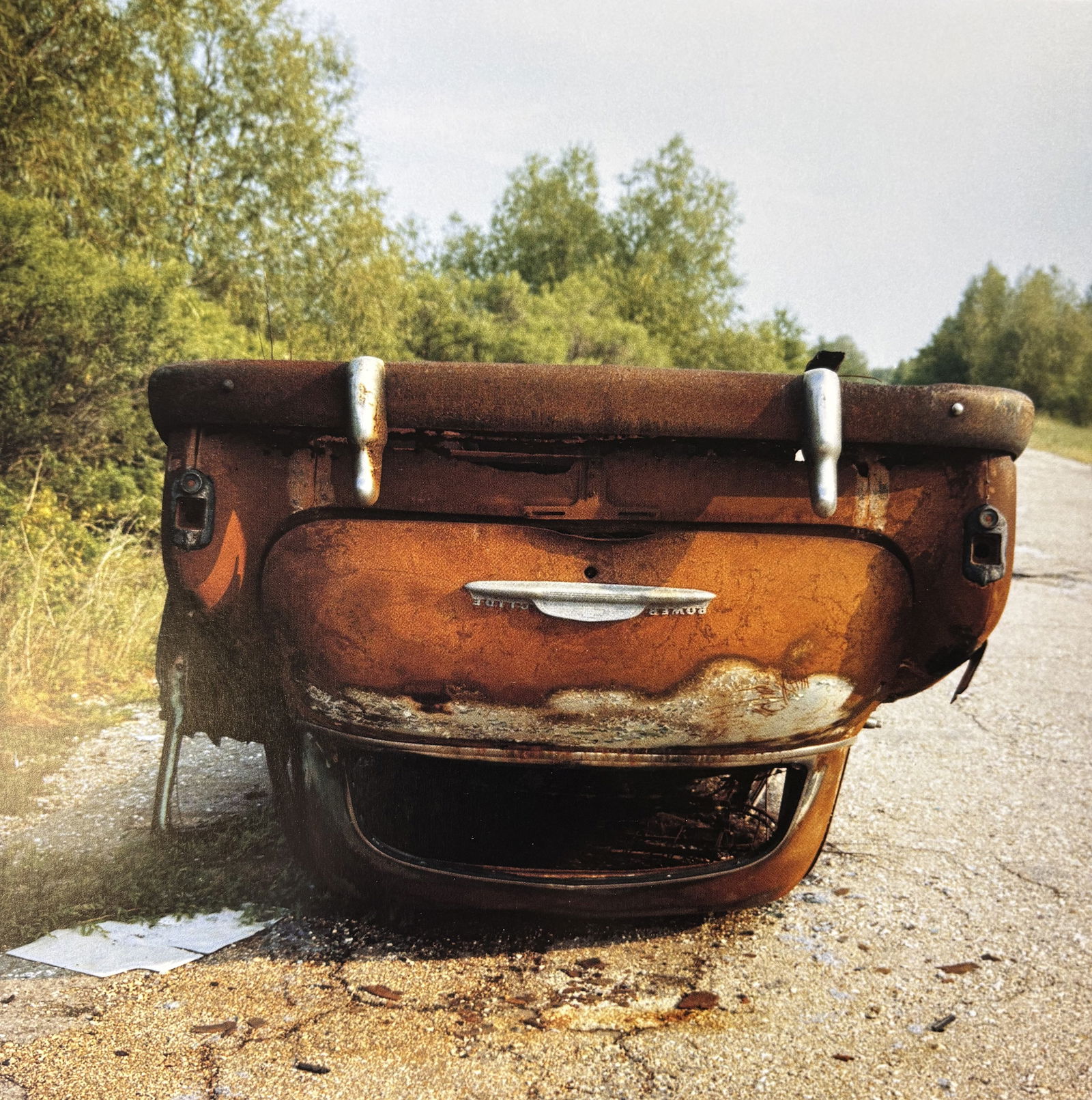 WILLIAM EGGLESTON UNTITLED PHOTO LITHO: William Eggleston Untitled Photo Lithograph mounted to same size board measuring at 9x9 inches