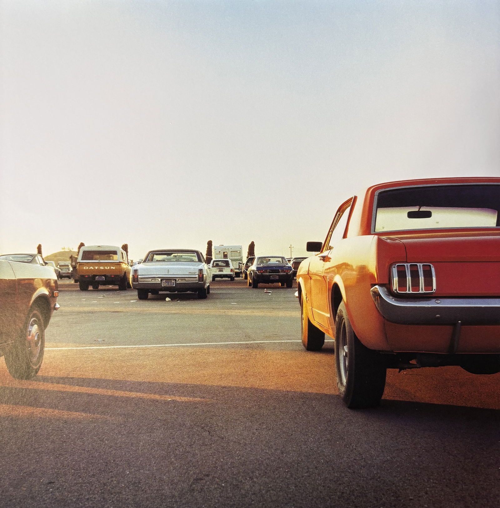 WILLIAM EGGLESTON UNTITLED PHOTO LITHO: William Eggleston Untitled Photo Lithograph mounted to same size board measuring at 9x9 inches