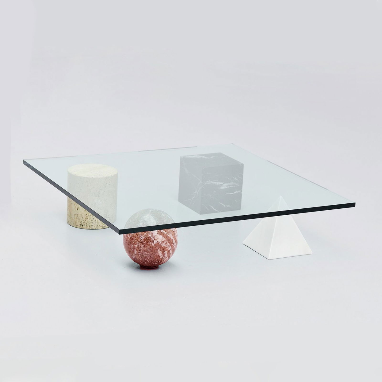 Lella & Massimo Vignelli, prod. Casigliani Italy, 1979 22x100x100 cm: Metafora coffee table in various marbles and beveled glass.Bibliography: G. Gramigna, Repertorio del design italiano 1950?2000, Allemandi, 2003, p. 266.