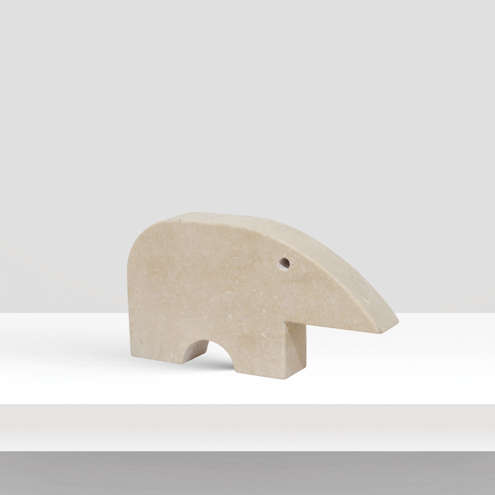 Enzo Mari prod. Fratelli Manelli Italy, 20th century 15x29x5 cm: travertine sculpture depicting a tapir.