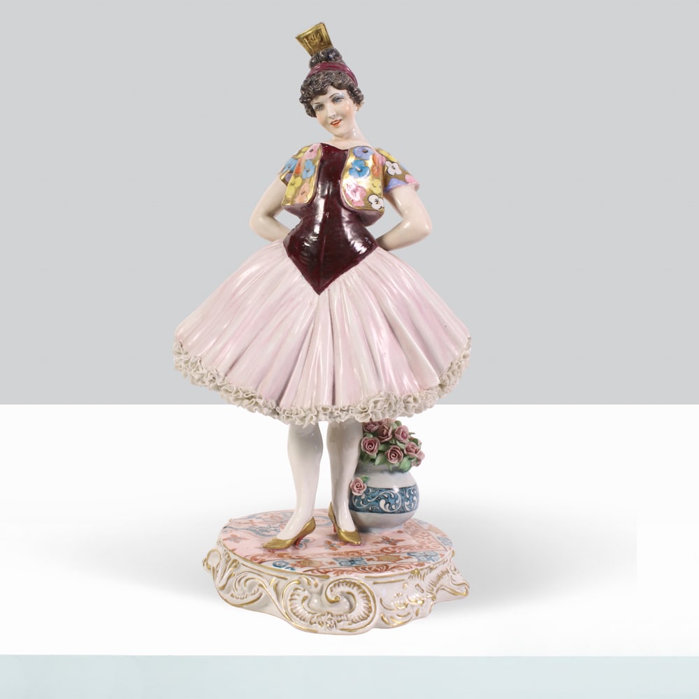 Fabris manufacture Bassano del Grappa, 20th century. h. 37cm: Glazed ceramic sculpture depicting a female figure, signature and maker's mark