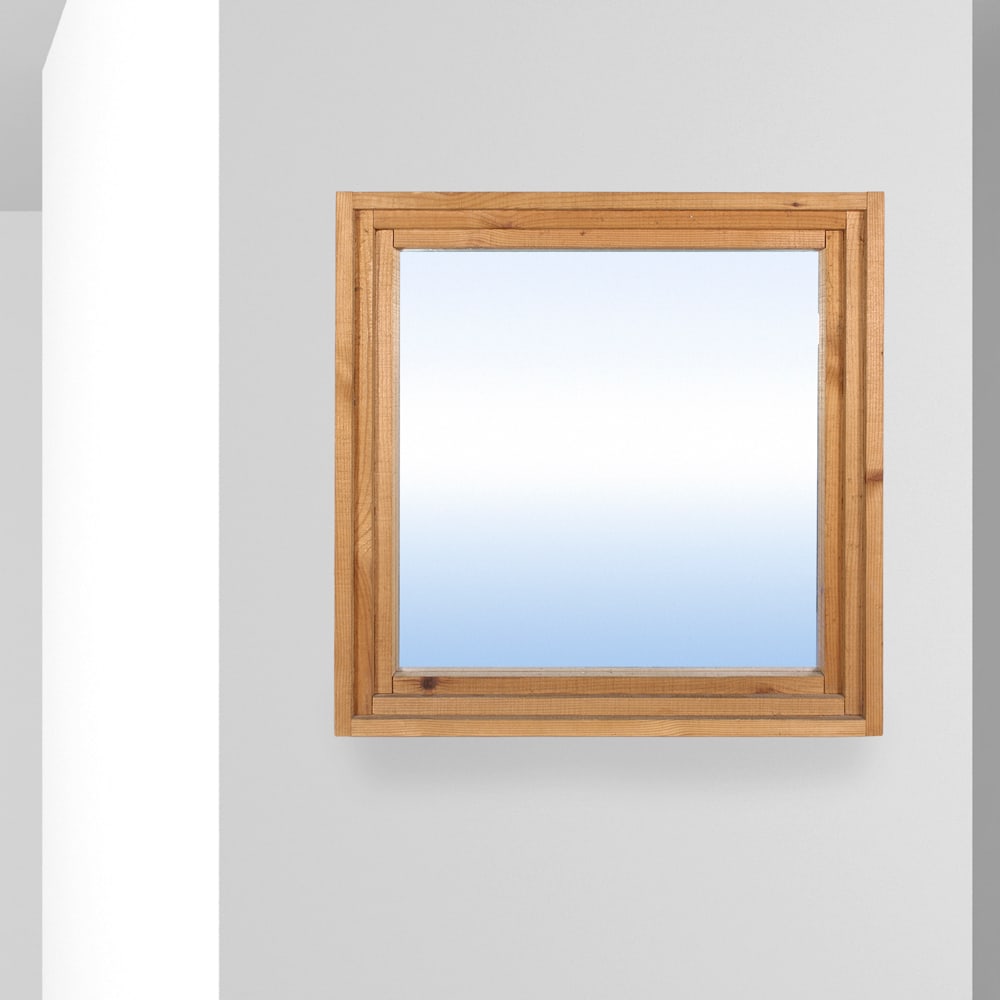 Mario Ceroli Italy, 70s 60x60x8 cm: wall mirror, mod. SPC. 60, mobili nella valle series.Bibliography: Pier Carlo Santini, Facendo Mobili con Poltronova, Artigraf Ed., 1996, p. 41. ? Original Poltronova catalogue, p. 13, list code CPS.