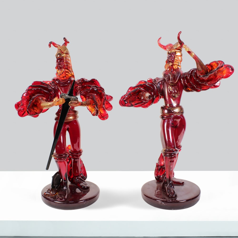 Oriental manufacture 20th century h. 37cm: pair of coloured glass sculptures depicting two samurai, one with defects and losses.
