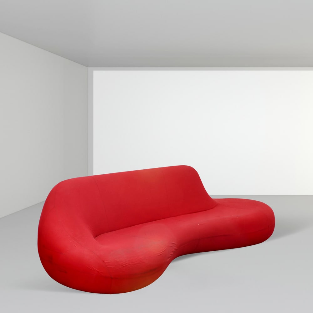 Karim Rashid, prod. Zanotta Italy, 2000s 84x257x145 cm: polyurethane sofa mod. Koutchou, production label.