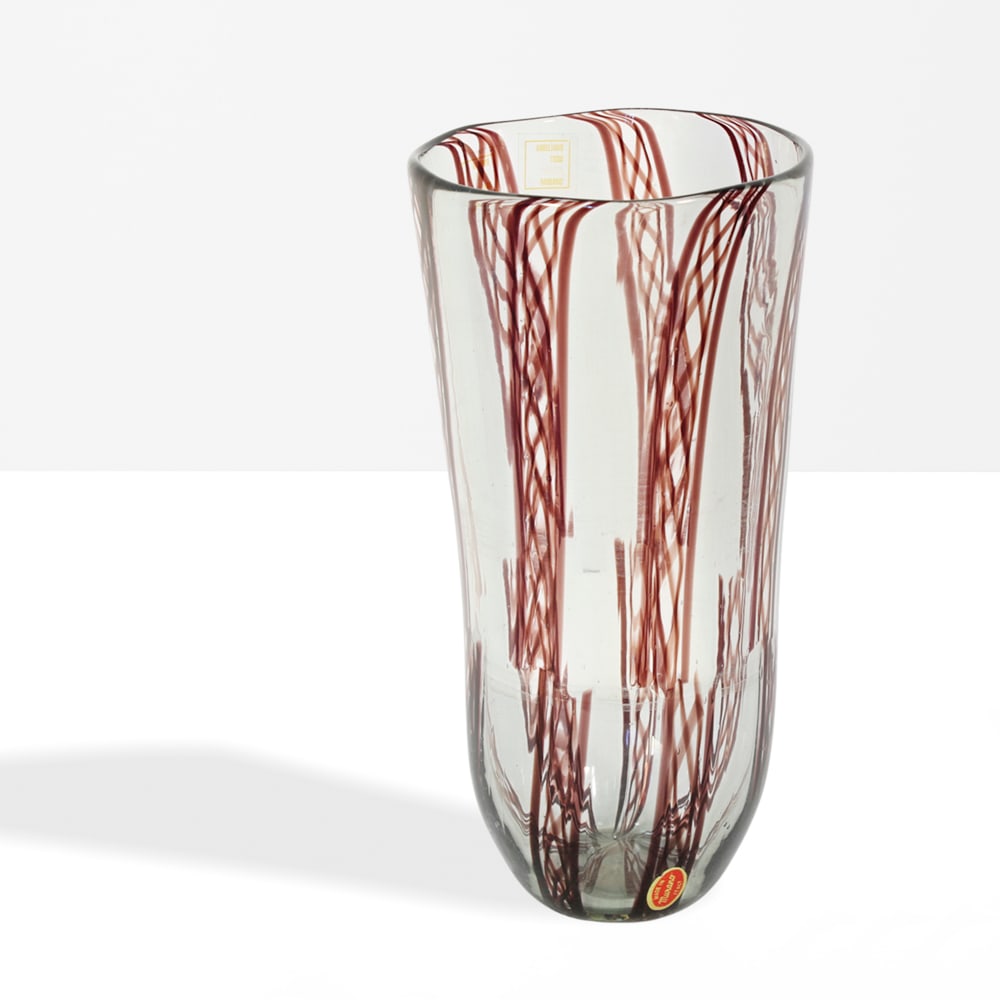 Aureliano Toso Murano, 20th century h. 30 cm: clear glass vase with zanfirico cane decoration, bearing the manufacturer?s label.