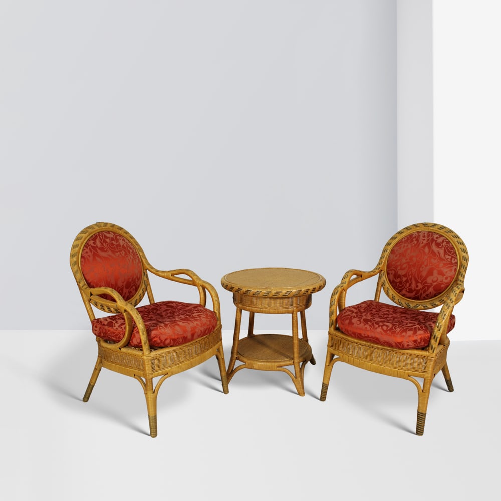 Italian manufacture 1960s chairs: 96x59x57 cm - coffee table: 62x60 cm: wicker and rattan lounge set comprising a coffee table and two chairs with padded seats and backs upholstered in fabric, minor wear.