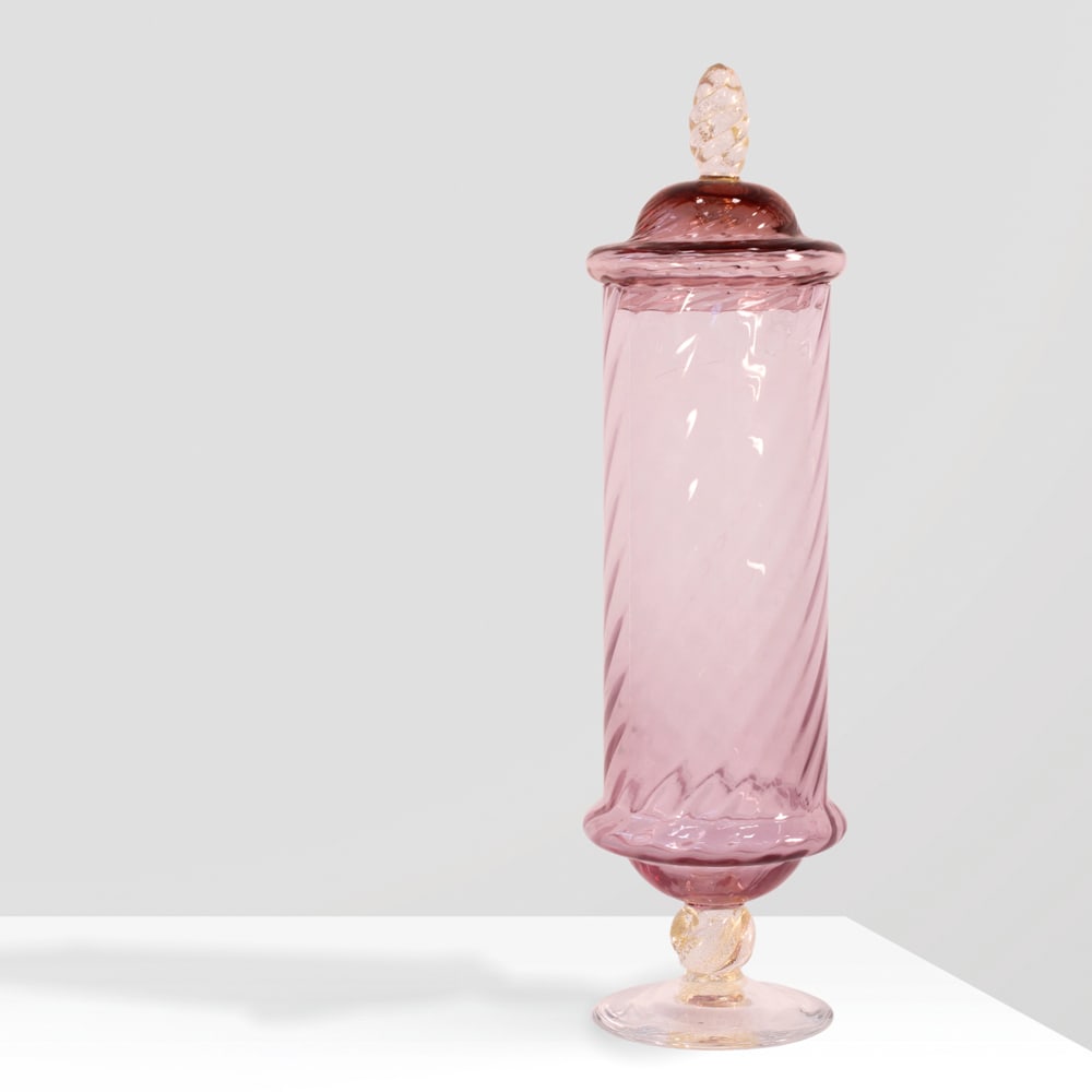 Cenedese & Albarelli Murano, 20th century h. 36.5 cm: container with lid in Murano glass in shades of pink and gold, signature engraved on the bottom, slight defects.