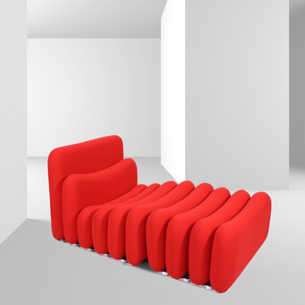 Joe Colombo prod. Sormani Italy, 1969-1974 67x127x24 cm: Modular armchair with ottoman mod. Additional System in polyurethane and red elastic fabric, bearing the manufacturer?s marks.Bibliography:Domus, no. 483 (February 1970), p. 44; no. 487 (June 1970), a