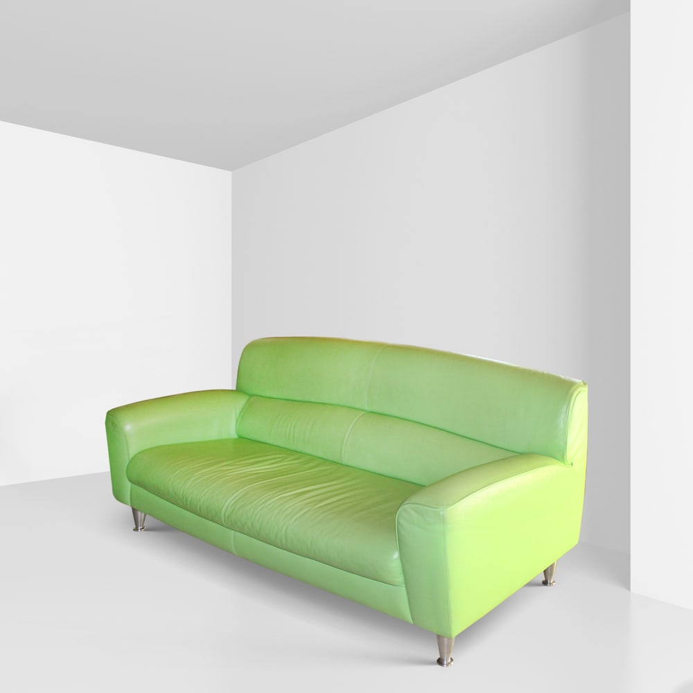 Poltrona Frau Italy, 2000s 85x190x90 cm.: three seater sofa mod. Madison, padded structure covered in green leather, steel feet