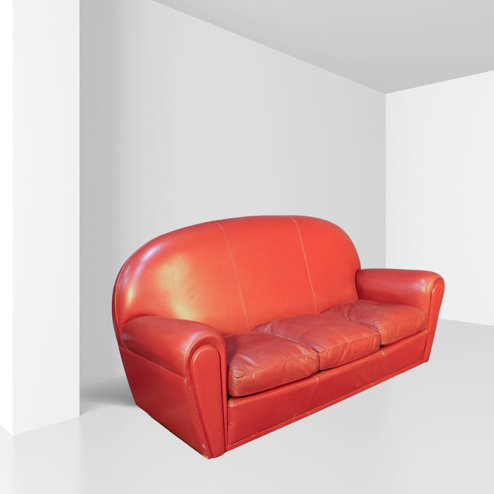Poltrona Frau Italy, 1930s 95x200x80 cm: three seater sofa mod. Vanity Fair, entirely padded and covered in red leather, defects.
