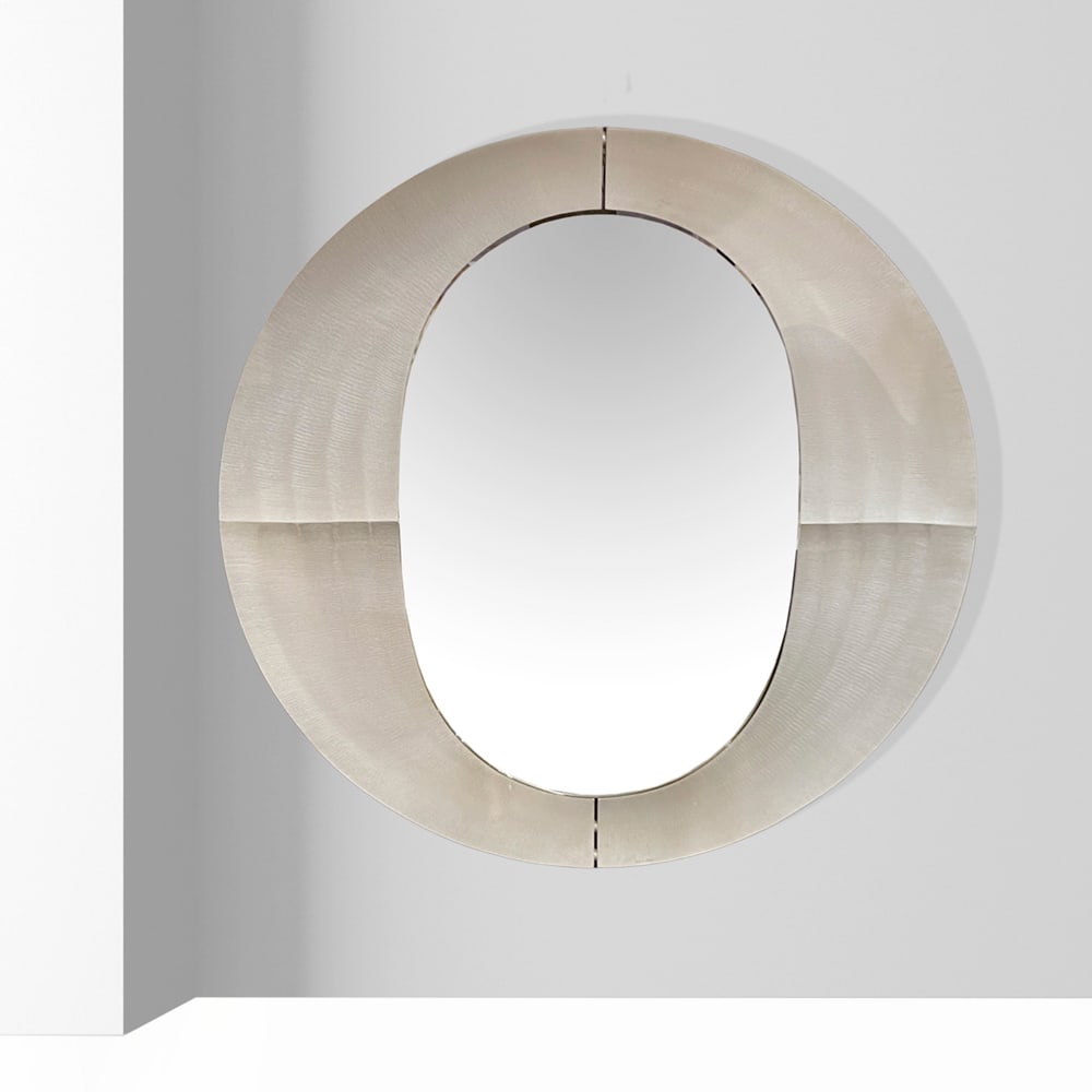 Lorenzo Burchiellaro Italy, late 1960s 98x100 cm: Wall mirror in hand-worked aluminum with mirrored glass, impressed artist?s signature.