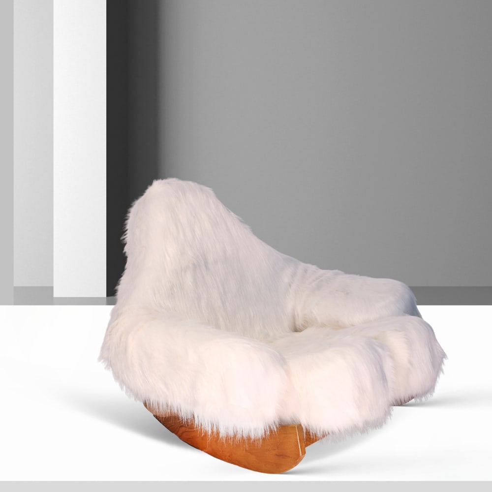 Mario Scheichenbauer prod. Elam Italy, 1968 89x110x106 cm: rocking armchair mod. Yeti, wood structure with removable foam padding upholstered in long-pile fabric.Bibliography:Domus, no. 504, November 1971, cover; Giuliana Gramigna, *Repertorio del design ital