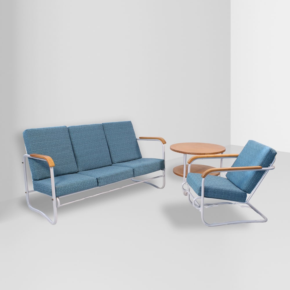 Cova Italy, 1920s-1930s sofa: 87x158x69 cm. - armchair: 75x58x80 cm. - coffee table: 58x70 cm.: lounge set in steel, wood and fabric comprising a three-seat sofa, an armchair and a coffee table.