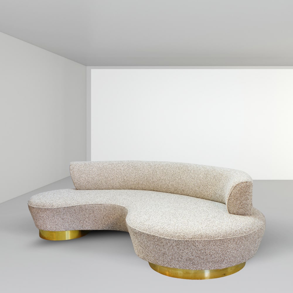 American manufacture 1980s 75x260x120 cm: asymmetrical sofa in boucle fabric and brass.