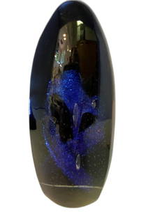 Starburst Paperweight: Unusual and beautiful vintage paperweight. If you add lighting underneath you will see an incredible burst of stars inside the glass. Measures 7" tall.
