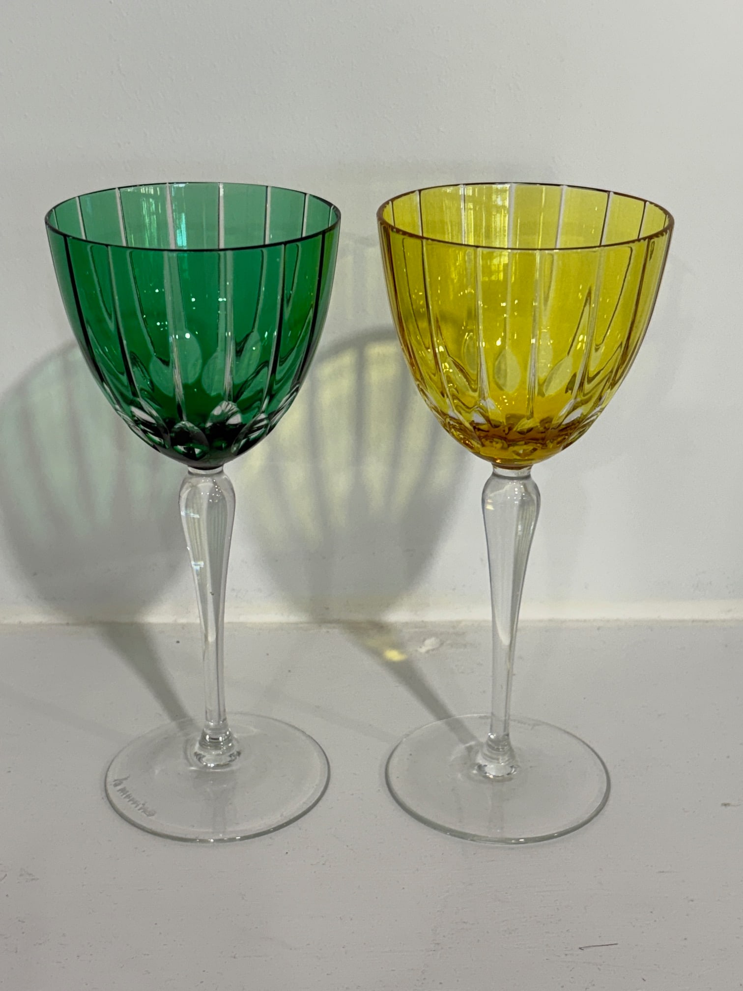 Wine Glasses by La Murrina of Murano: This beautiful pair of etched glass wine glasses from Murano were made by the furnaces of La Murrina. Measure 8" tall. Marked by maker.