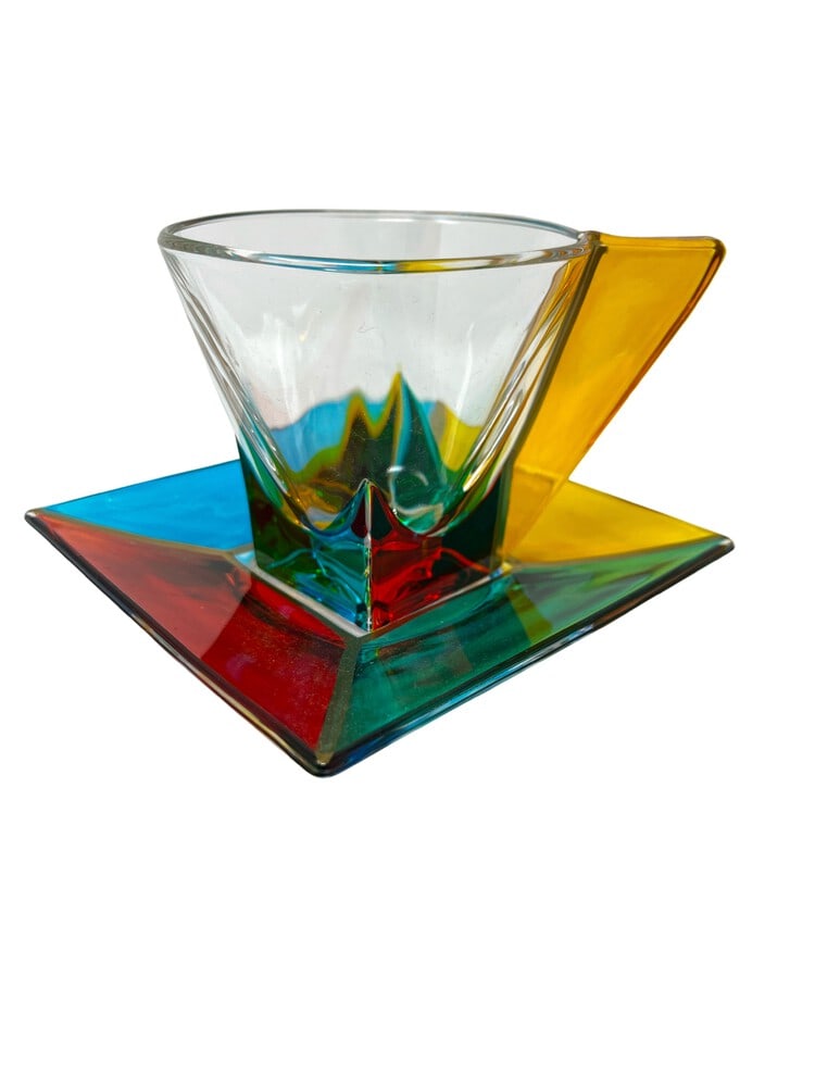 Venetian Hand Painted Cups and Saucers, a Pair: This lovely set of 2 cups and saucers features incredible colors and would be a wonderful addition to any home. Handcrafted in Italy of fine cut crystal and beautifully hand painted by Venetian