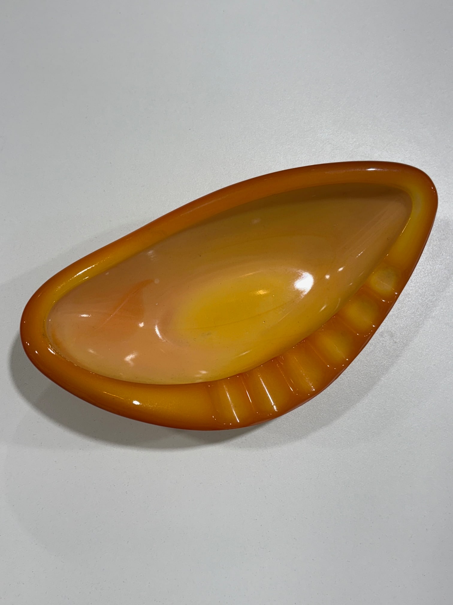 VintageYellow Retro Glass Ashtray: Very unusual and retro styled Glass Ashtray. Highly collectible and quite attractive. Measures 7.75" across.
