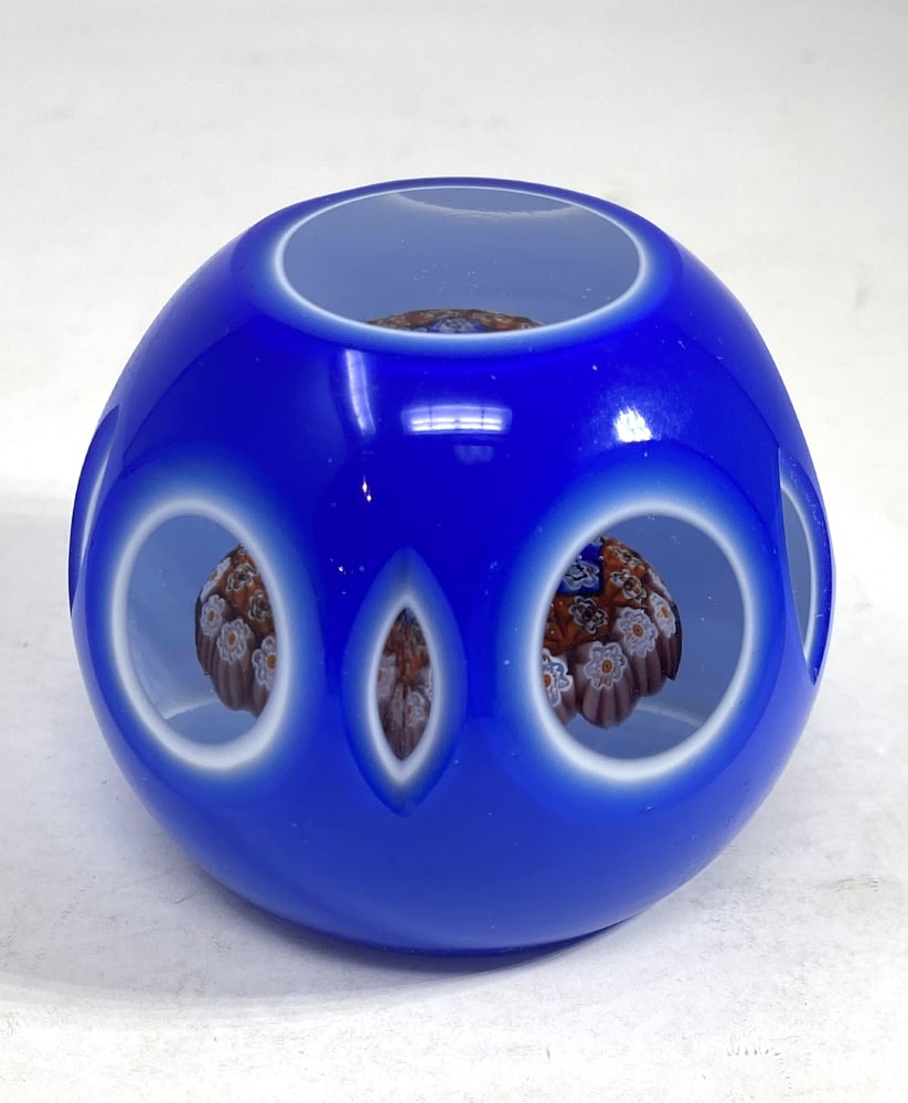 Vintage Murano Glass Baccarat Style Paperweight: Incredible example of Millefiore paperweight encased within faceted glass, made in Murano, Italy. Highly collectible and very rare. Measures 2.5" across.