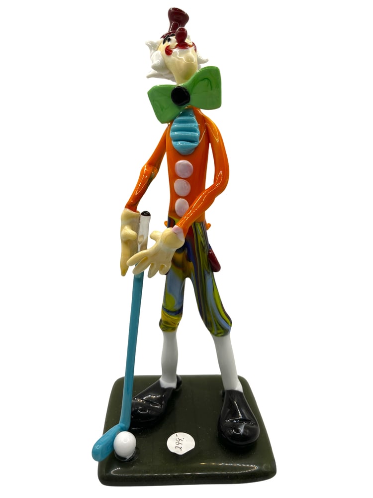 Murano Glass Golf Playing Clown: Murano Glass Clown Figurine by Renowned Glass Master Tommasi. Add a touch of whimsy and elegance to your home decor with this exquisite Murano glass clown figurine, expertly crafted by one of the