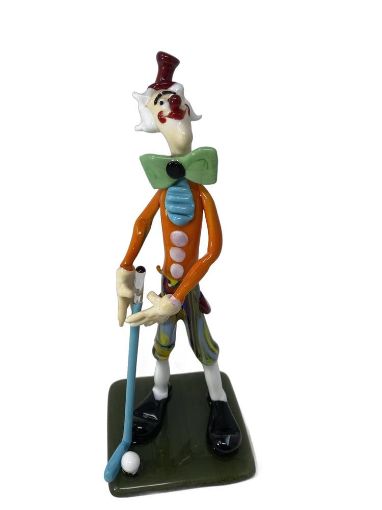Murano Glass Golfer Clown: Murano Glass Clown Figurine by Renowned Glass Master Tommasi. Add a touch of whimsy and elegance to your home decor with this exquisite Murano glass clown figurine, expertly crafted by one of the