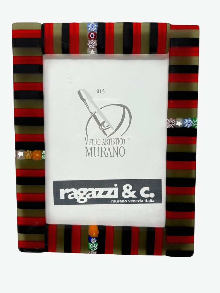 Murano Glass Picture Frame: Beautiful Murano Glass picture frame. Brand new. Created by one of the top Artists in Murano. Measures 8" x 6.75".