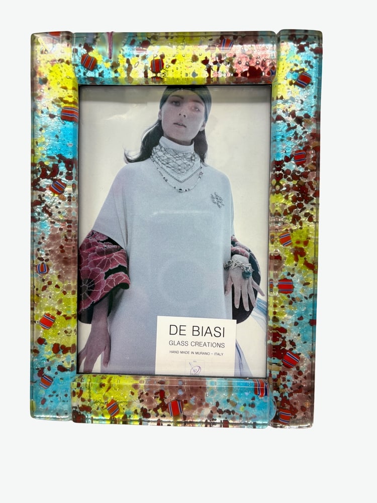 Murano Glass Picture Frame: Beautiful Murano Glass picture frame. Brand new. Created by one of the top Artists in Murano. Measures 7.5" x 5.5".