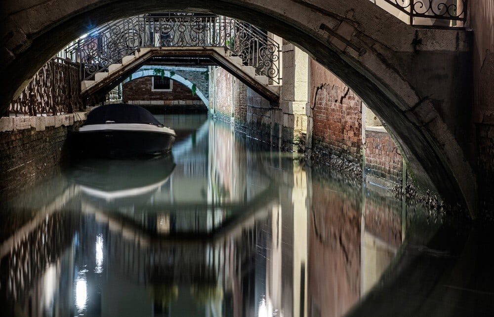 Three Bridges in Venice Photo on Canvas: This lovely photograph on canvas would make an ideal wall piece for any room. The scene features three canal bridges in Venice, late in the day. The piece is wrapped so no framing is necessary for