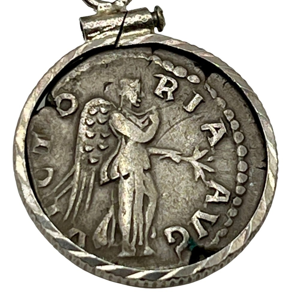 Emperor Hadrian and Angel Roman Coin Pendant: Acquire a piece of ancient history with this genuine silver coin, featuring Emperor Hadrian and an Angel, masterfully converted into an exquisite pendant necklace. A very rare and significant piece of