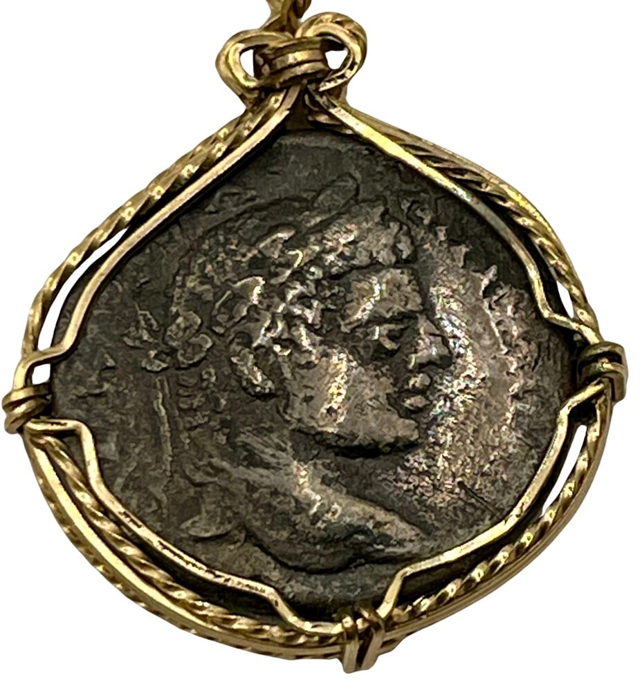 Emperor Caracalla and Eagle Coin Pendant: Acquire a piece of ancient history with this genuine Roman coin, featuring Emperor Caracalla and Zeus, masterfully converted into an exquisite pendant necklace. (#12A)Highlights:- Authentic ancient