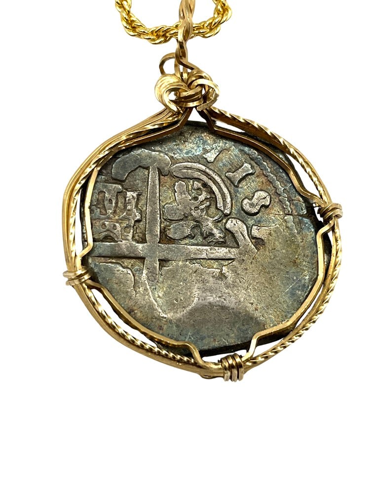 Spanish Shipwreck Coin 8 Reale Circa 1650: Rare Silver 8-Reale Spanish Shipwreck Coin Pendant-A Piece of HistoryOwn a piece of ancient history with this authentic bronze coin, expertly transformed into a stunning pendant. (#415)
