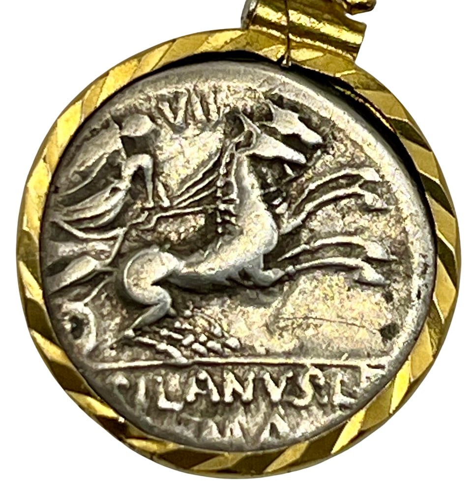 Roman Chariot and Goddess Roma Pendant: Roman Chariot and Goddess Roma, authentic silver coin, expertly transformed into astunning pendant necklace. (#175) Features:Genuine ancient silver coin (circa 100 BCE)Beautifully mounted in a pendant
