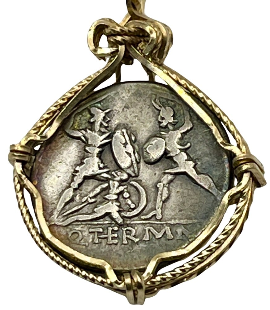 Roman Gladiators in Battle Coin Pendant: Rare Gladiators in Battle Coin made into a Pendant-A Piece of History.Own a piece of ancient history with this authentic silver coin, expertly transformed into a stunning pendant. (#362)Genuine ancien