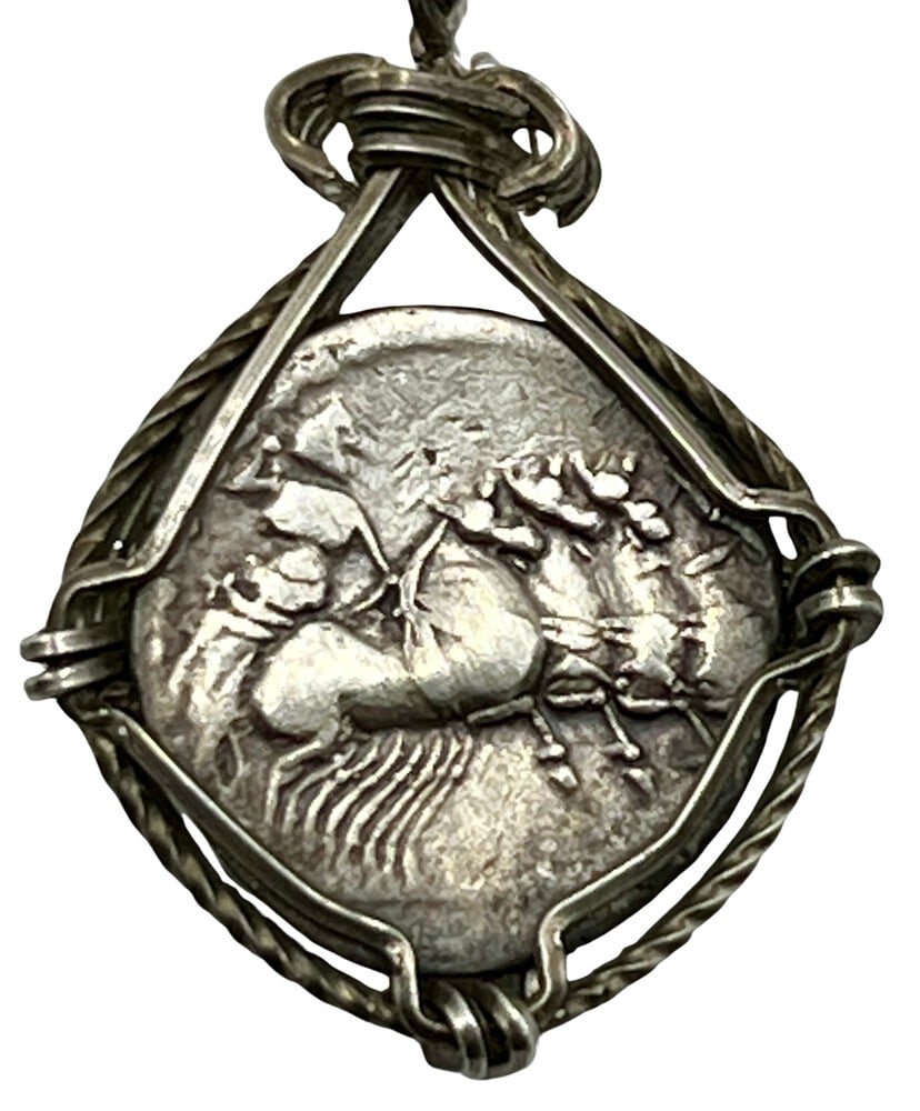 Gladiator and Roma, Goddess of Rome Pendant: Roman Chariot and Goddess Roma, authentic silver coin, expertly transformed into a stunning pendant necklace. (#177)Genuine ancient silver coin (circa 137 BCE)Beautifully mounted in a pendant setting,