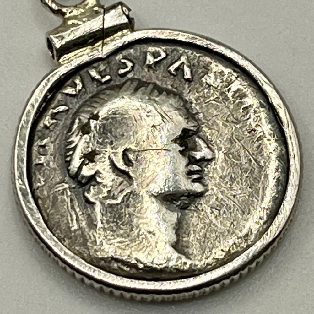 Emperor Vespasian, Builder of Colosseum Pendant: Roman Emperor Vespasian, builder of the Colosseum, authentic silver coin, expertly transformed into a stunning pendant necklace. (#104)Genuine ancient silver coin (circa 70 AD)Beautifully mounted in a