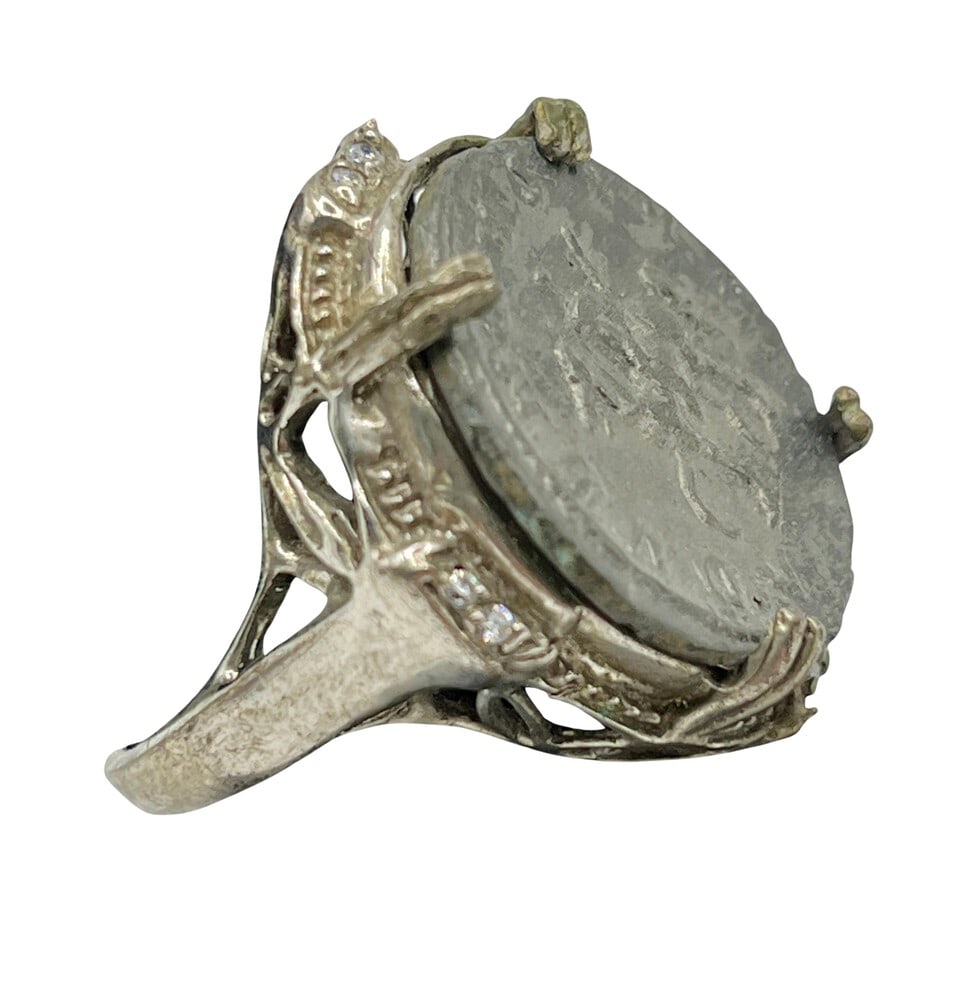 Ancient Roman Emperor Severus Coin Made into Ring: Ancient Coin of Roman Emperor Severus with this authentic silver coin, expertly transformed into a beautiful ring. (#165)Genuine ancient silver coin (circa 200 AD).Beautifully mounted in a ring, showc