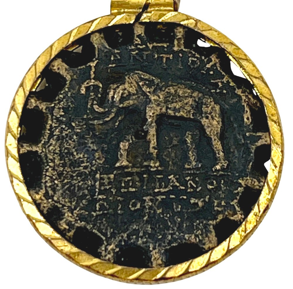 Elephant and Dionysus Greek Coin: Elephant and Dionysus, authentic bronze coin, expertly transformed into a stunning pendant necklace (#370).Genuine ancient bronze coin (circa 148 BCE).Beautifully mounted in a pendant setting, showcas