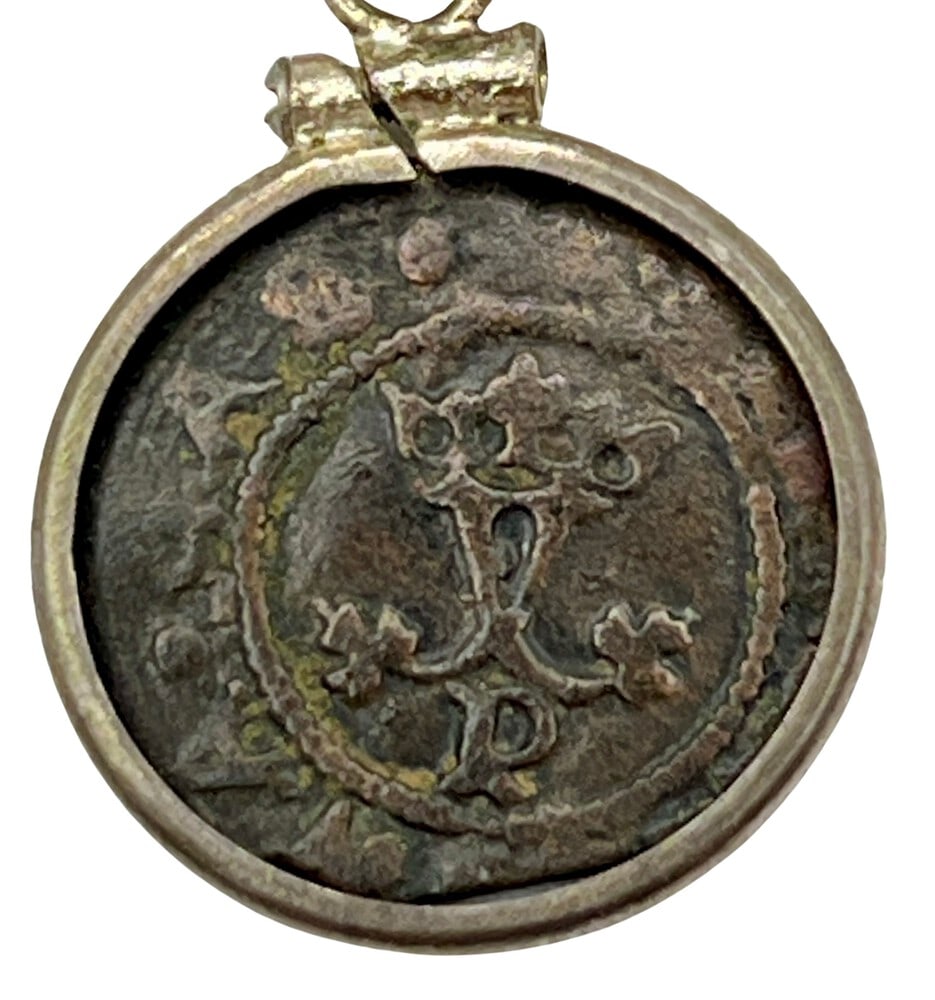 Columbus Era Spanish Coin: Columbus Era Spanish Coin Pendant-A Piece of History.Own a piece of ancient history with this authentic bronze coin, expertly transformed into a stunning pendant (#127).Genuine ancient bronze coin (ci