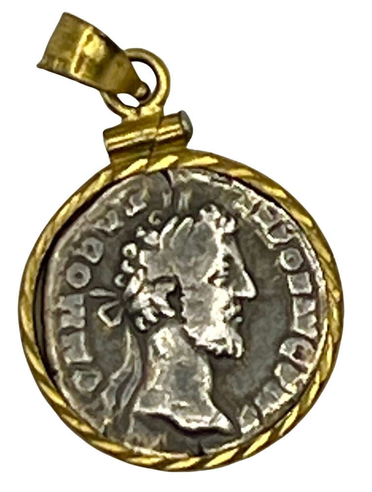 Ancient Roman Coin of Emperor Conmodus: Ancient Silver Coin of Emperor Commodus Pendant-A Piece of History.Own a piece of ancient history with this authentic silver coin, expertly transformed into a stunning pendant (#359).Genuine ancient s