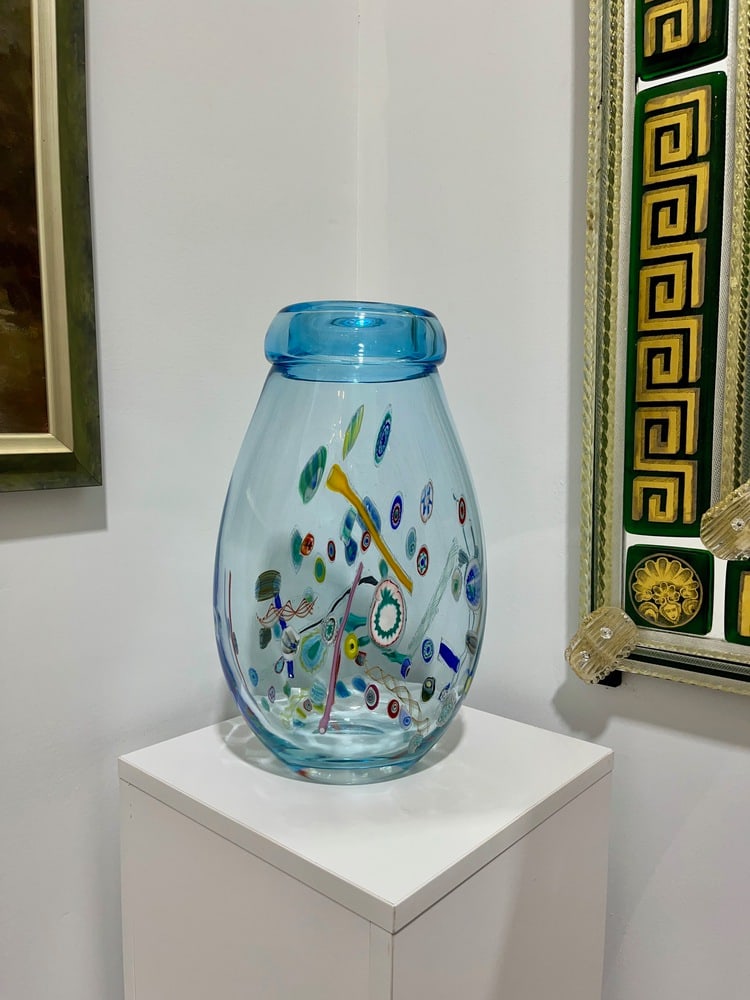 Beautiful Vintage Murano Glass Vase: Gorgeous light blue Murano Glass Vase with millefiore decoration. Vintage piece which measures 15.5" tall. Signed by the Artist!