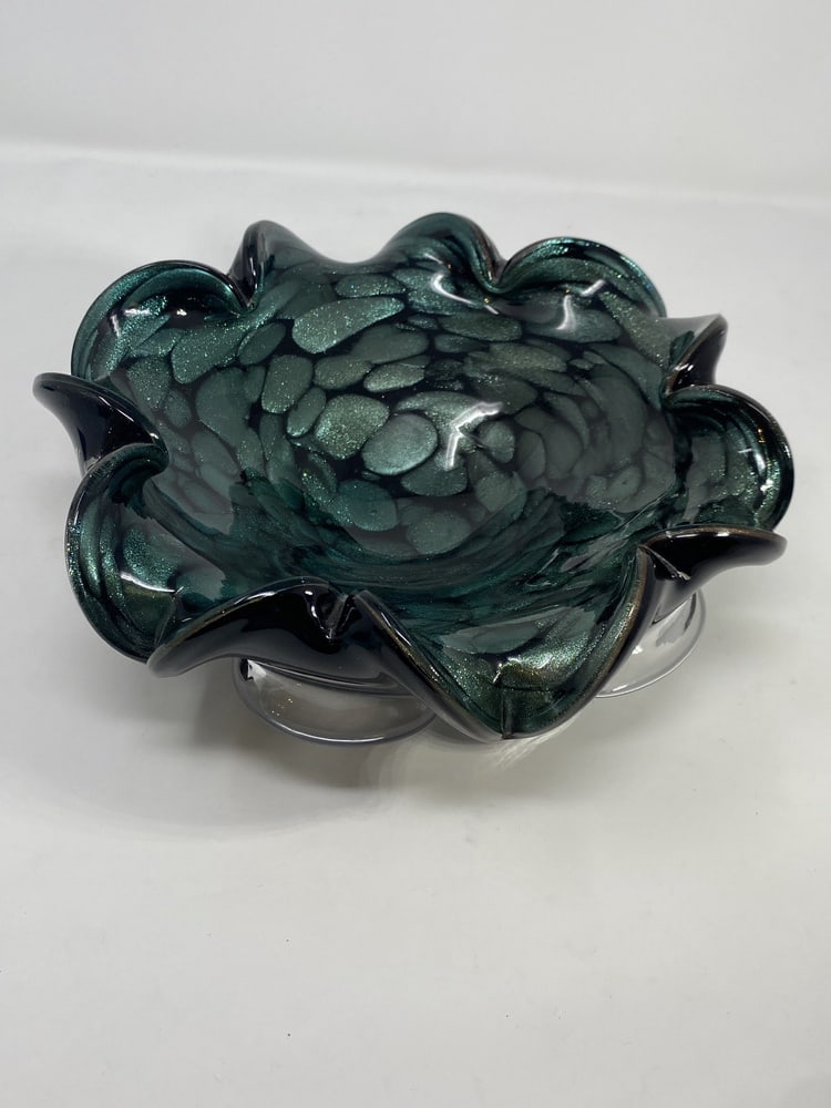 Vintage Murano Candy Dish: What a beautiful vintage Murano Glass Candy Dish. The color is quite unusual: a deep green with avventurine in the background. Very rare and highly collectible. Measures 8.5" across.
