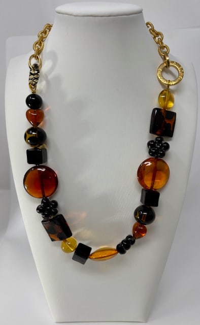 Murano Glass Necklace: Beautiful handmade necklace from the Artisans of Murano. Each bead is meticulously crafted and made into a wonderful and unique piece of jewelry. Measures 21".