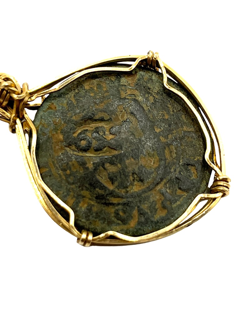Spanish Shipwreck Coin 8 Reale Dated 1652: Rare Dated Spanish Shipwreck Coin Pendant-A Piece of HistoryOwn a piece of ancient history with this authentic bronze coin, expertly transformed into a stunning pendant. (#420) Features:Genuine