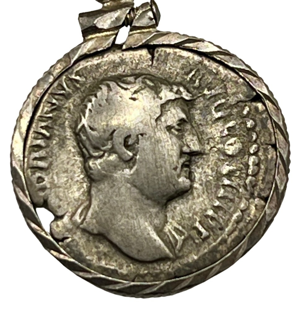 Emperor Hadrian Coin Pendant: Acquire a fragment of ancient history with this genuine silver coin, featuring Emperor Hadrian and Venus, masterfully converted into an exquisite pendant necklace. (#50)Highlights:- Authentic ancient 