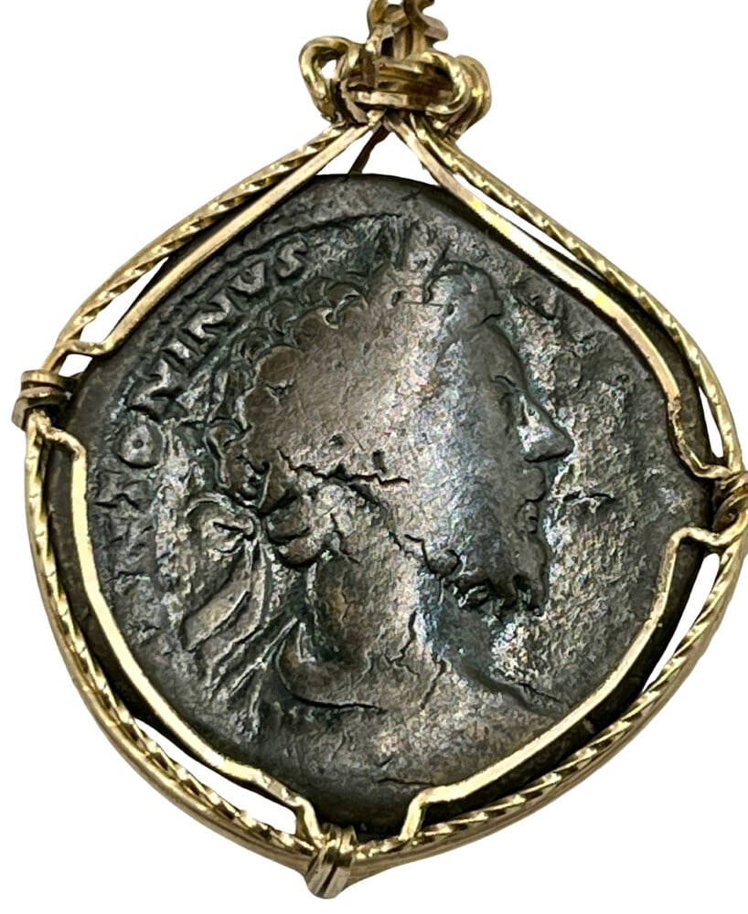 Ancient Poseidon and Zeus Grecian Coin: Greek Coin that features Poseidon and Zeus, expertly transformed into a stunning pendant necklace (#32).Genuine ancient bronze coin (circa 300 BCE).Beautifully mounted in a pendant setting,