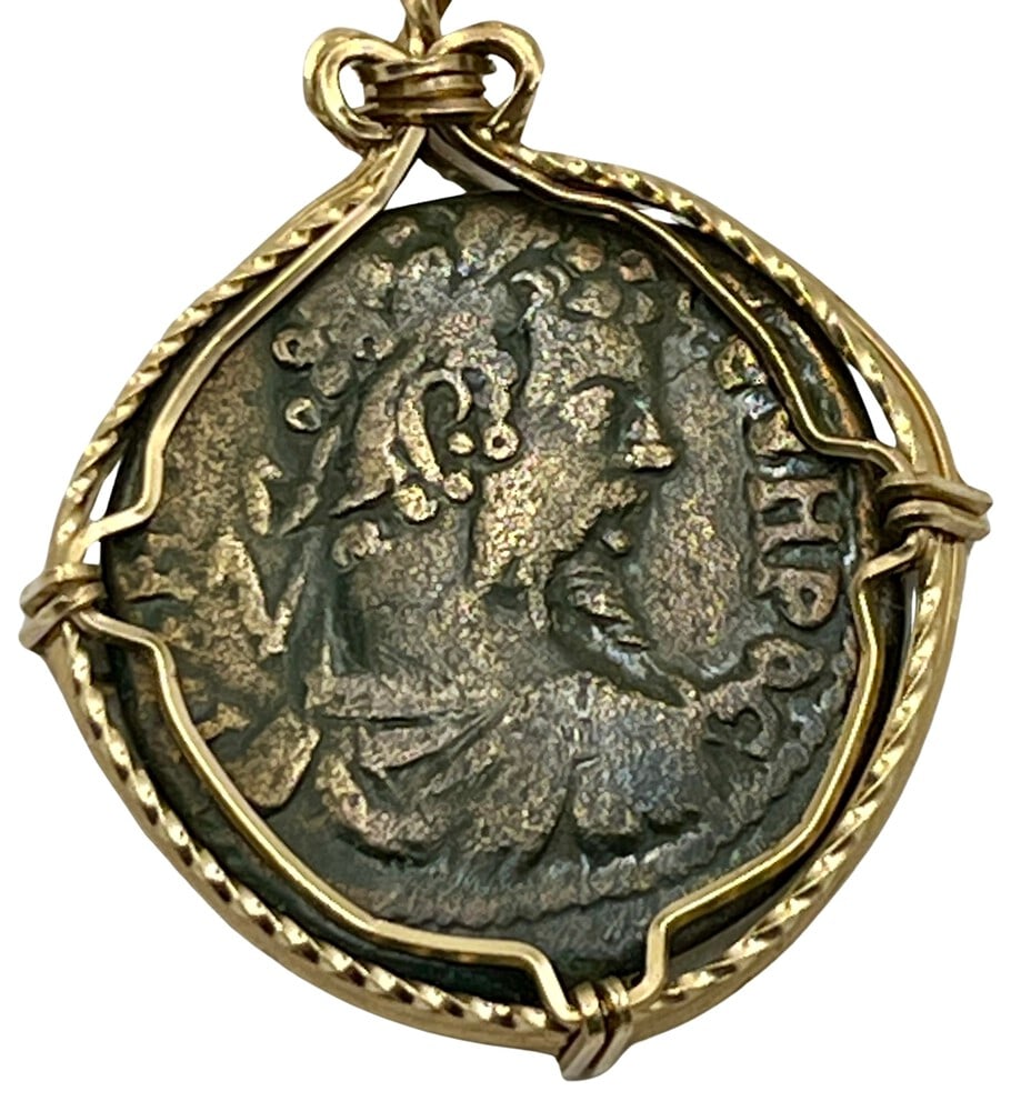 Emperor Severus Coin Pendant: Acquire a fragment of ancient history with this genuine bronze coin, featuring Emperor Septimius Severus, masterfully converted into an exquisite pendant necklace. (#10)Highlights:- Authentic ancient 